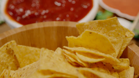 Close-Up-Of-Snacks-Of-Tortilla-Chips-And-Salsa-At-St-Patrick's-Day-Party